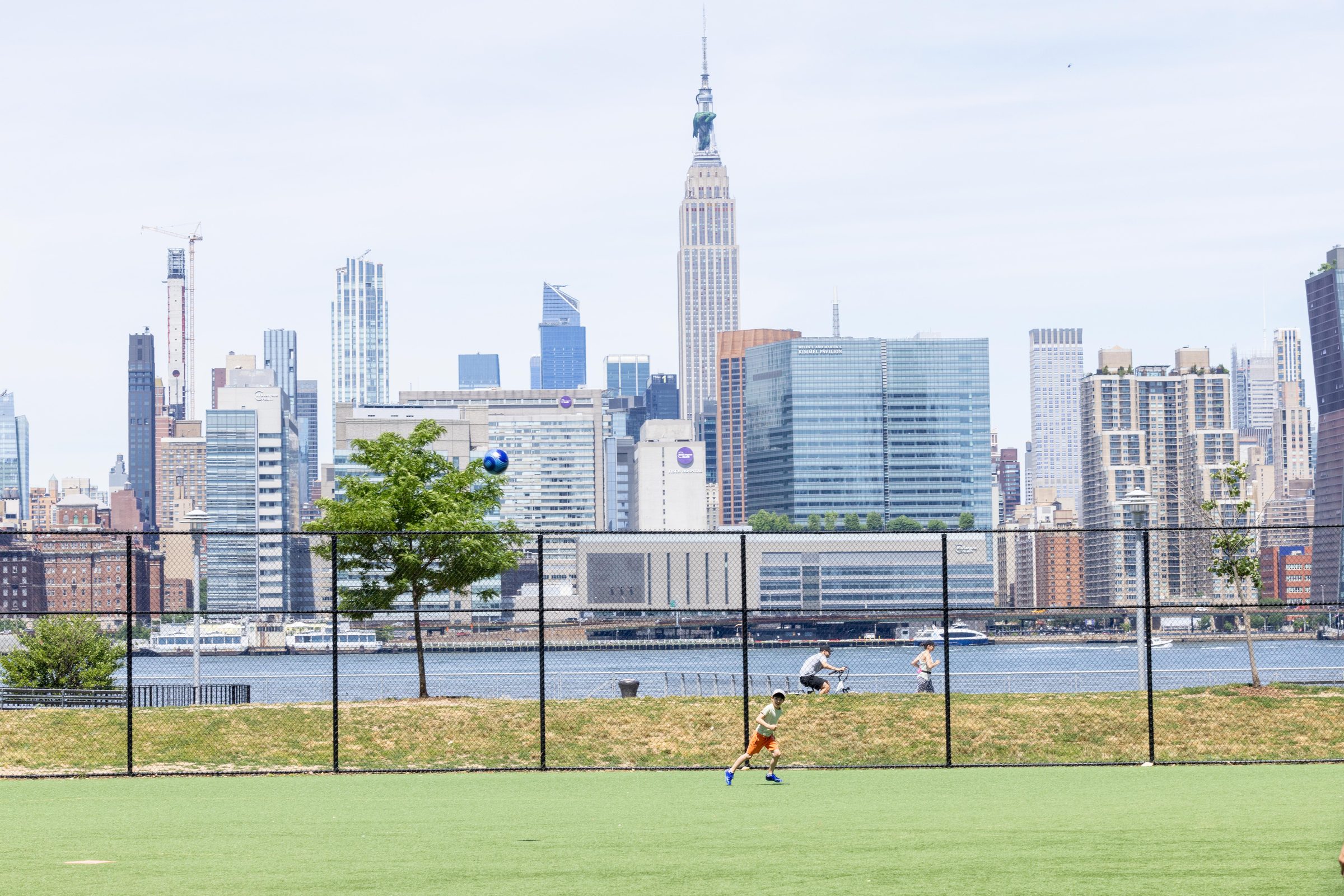 Open green field at a Greenpoint park