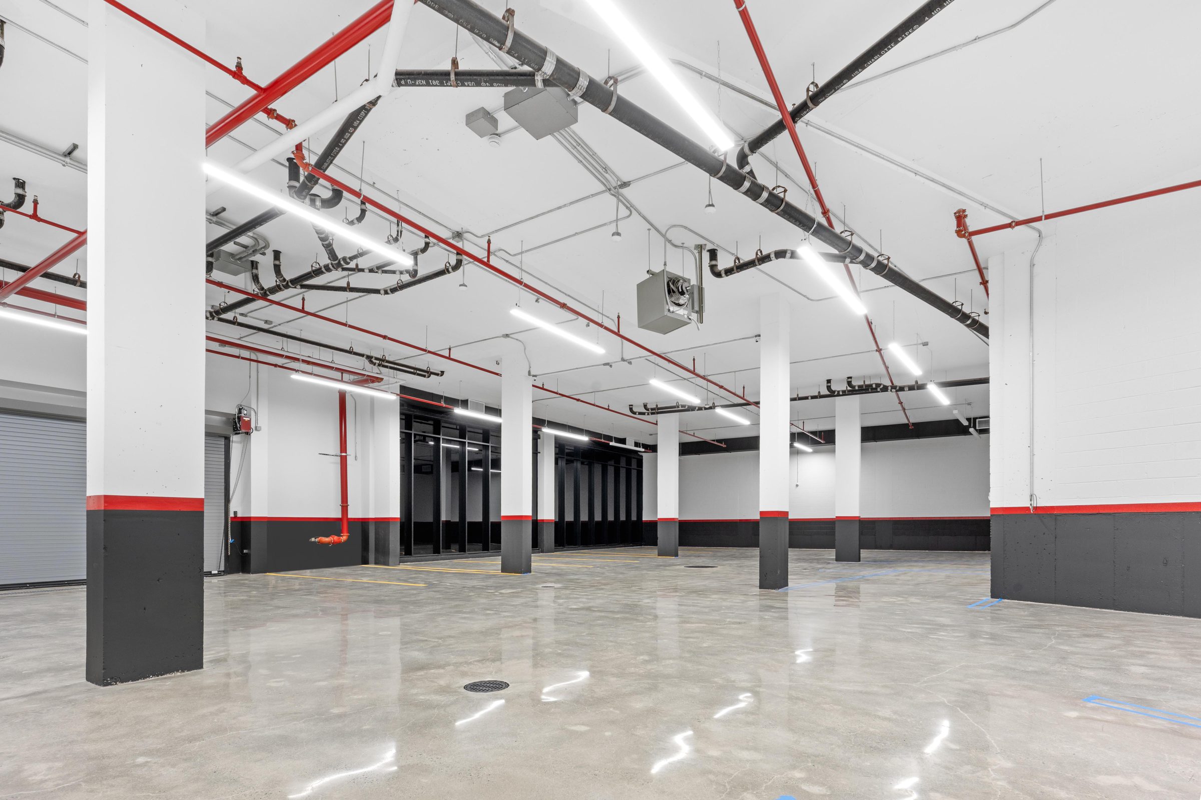Secure resident parking garage with EV charging